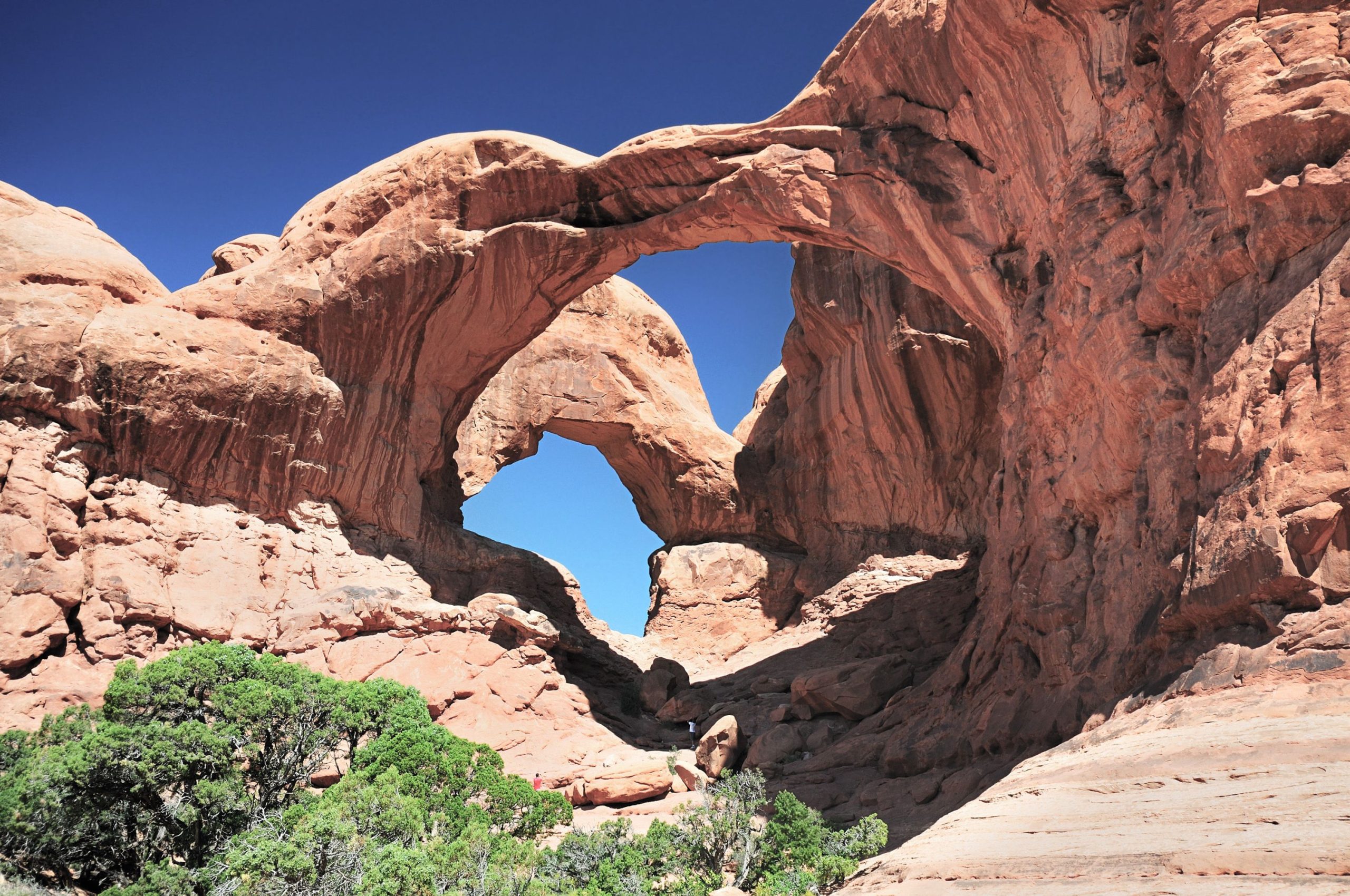 Two arches of rock at Arches National Park.